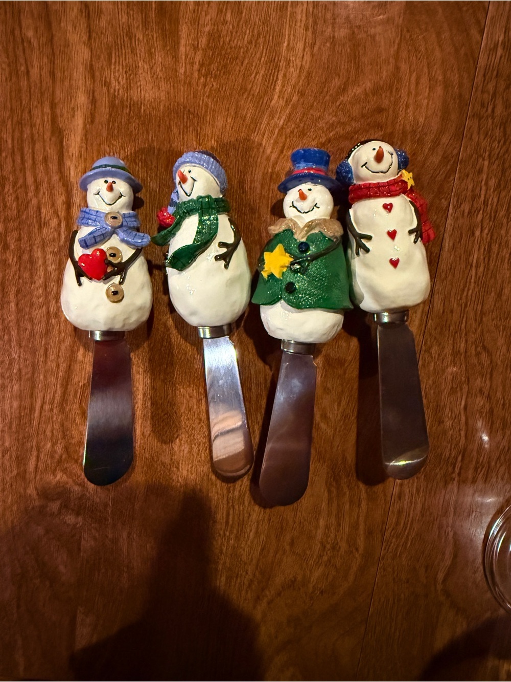 Bundle of stainless steel snowman 2 inch cheese spreaders